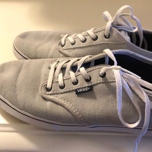 Navy pinstriped Vans sneakers gently worn